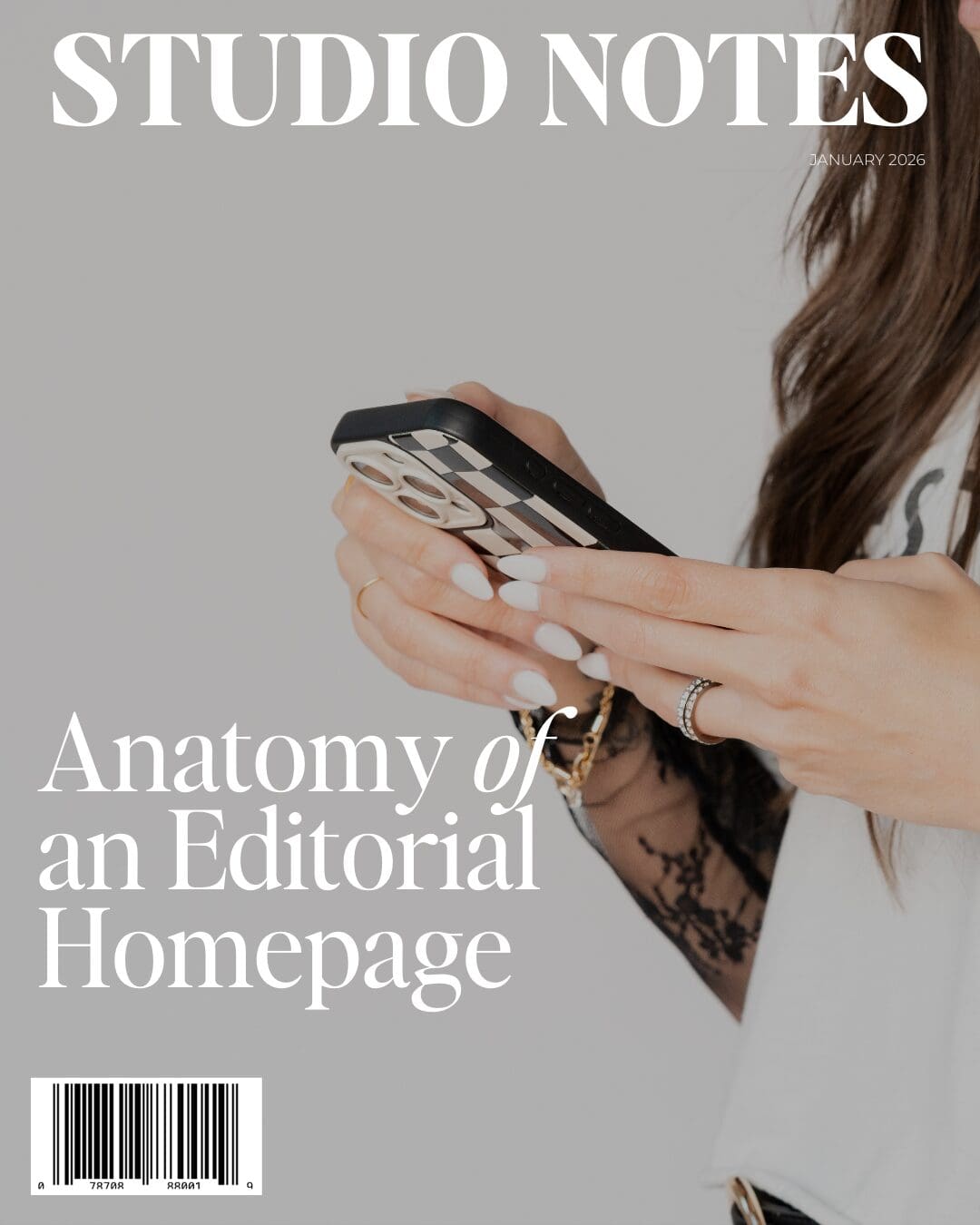 Magazine cover mockup with title Studio Notes and a issue header that reads "Anatomy of an Editorial Homepage" for the editorial homepage anatomy article. Image is a close up of a hand holding a phone.